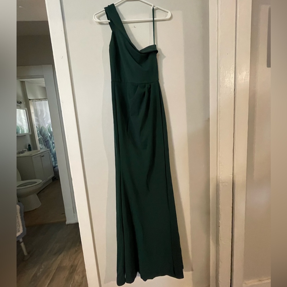 Emerald green dress, asymmetrical sleeve, left leg slit